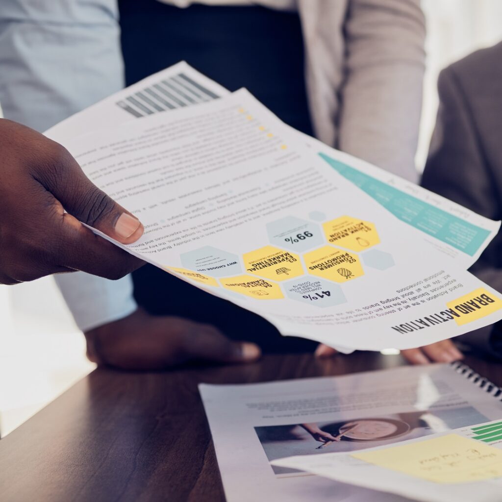 Business people hands, documents and marketing team planning, collaboration and analytics in advert