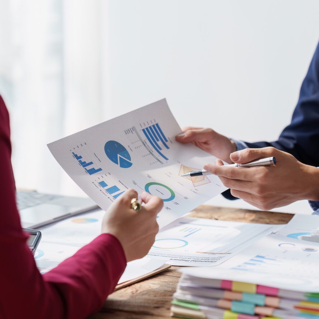 Group of Business People Meeting analysis financial plan, discussion, research with paperwork at